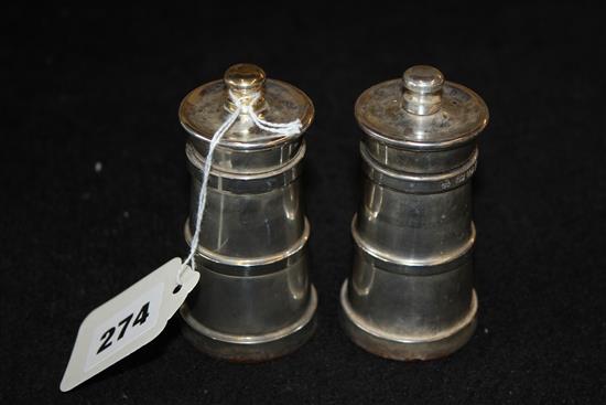 Two silver capstan pepper mills, with Cole & Mason mechanism, London 2000 Millennium mark (a.f)